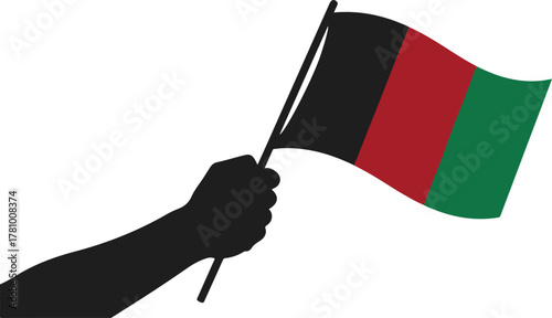 Proud hand waving the national flag of afghanistan patriotically