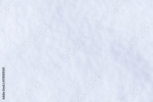 A white snow background image with a subtle, soft snow texture