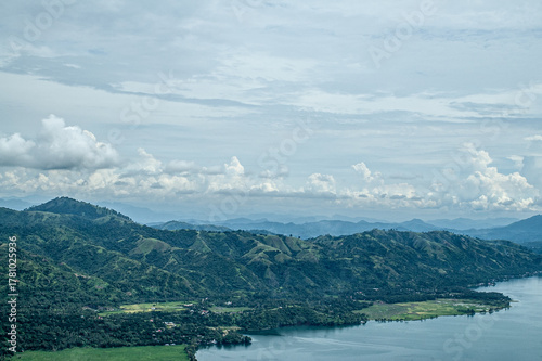 Volcanic mountain range in the tropical island of North Sumatra, Indonesia, viewed from an airplane