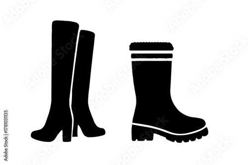Black rubber rain boots with a pair of warm socks are isolated footwear for winter weather