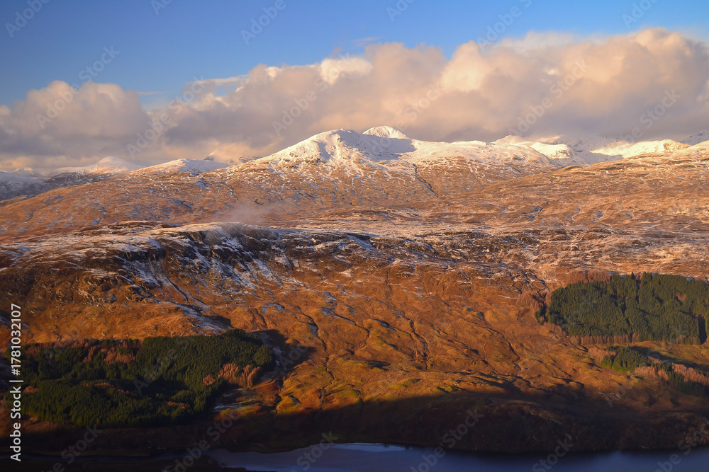 Obraz premium Winter view from the summit of Ben More mountain in the Breadalbane region of the southern Scottish Highlands, near Crianlarich, Scotland, United Kingdom