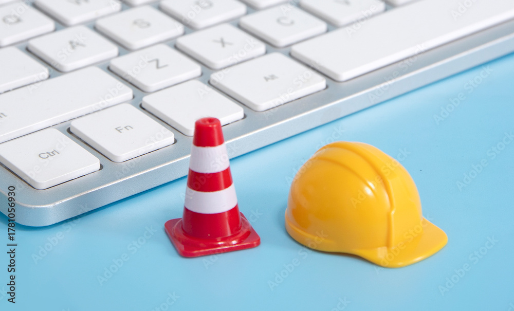 Fototapeta premium warning under construction , website under maintenance , troubleshooting and fixing