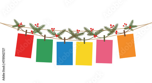 Colorful paper notes hanging with festive decorations and holly  