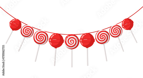 Red spiral lollipops hanging on string in festive style  