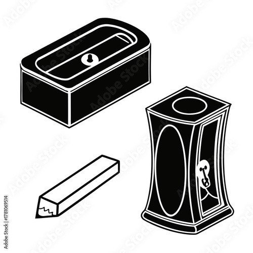 Collection of vintage pencil sharpeners and a pencil lead