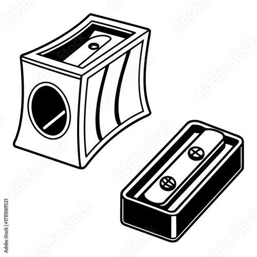 Two pencil sharpeners, one rectangular and one cube