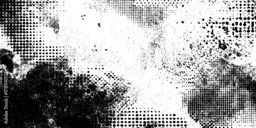 Abstract black and white halftone dot grunge splatter texture background.