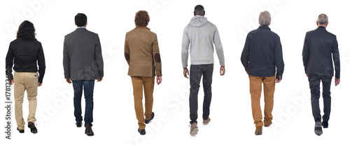rear view of a group of men walking on white background