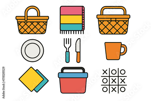 Colorful collection of picnic and outdoor activity items including basket, blanket, cooler, and cutlery