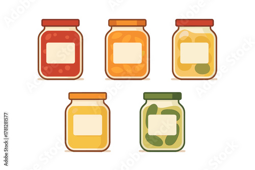 Five glass jars with homemade preserves, jam, honey, and pickled vegetables