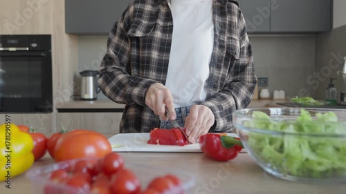 Slicing Fresh Vegetables On Kitchen Counter For Healthy Homemade Salad
