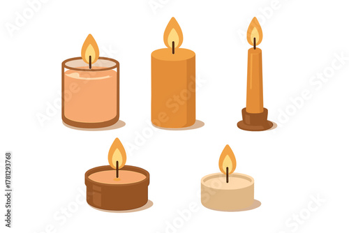 Set of various burning wax candles in different shapes and sizes including pillar taper and jar styles