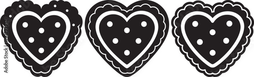Three heart shaped cookies with decorative edges and seed details silhouette