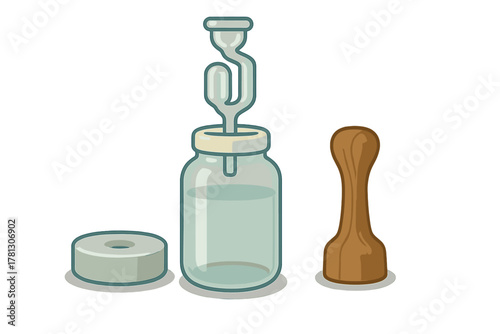 Home fermentation kit components including glass jar, airlock, wooden tamper, and weight