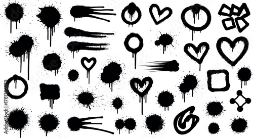 Collection of black spray paint splatter and drip elements for graffiti art and design