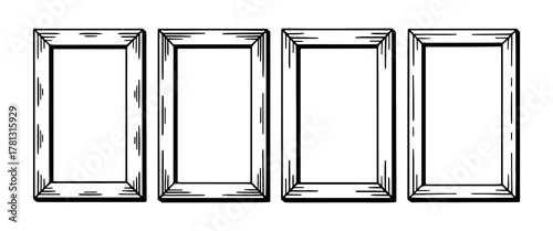 Four empty wooden picture frames lined up ready for artwork display or decoration in a simple, artistic setting