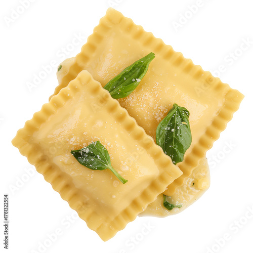 Homemade Ravioli Topped With Fresh Basil and Cheese in Creamy Sauce
