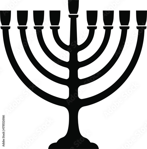 Silhouette of a traditional menorah with nine candle holders on a white background