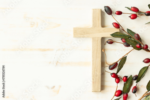 Wood cross and red christmas berry border