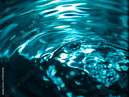 410.Blue-Green Water Ripples With Reflective Highlights