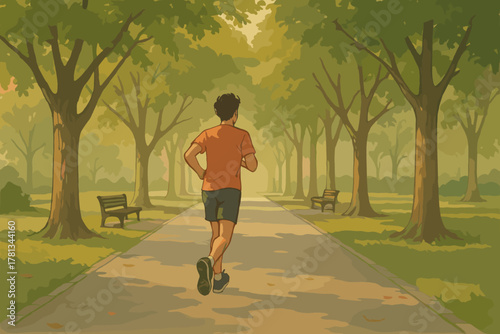 Young male jogging on a tree-lined park path in a sunny setting, wearing an orange shirt and black shorts.