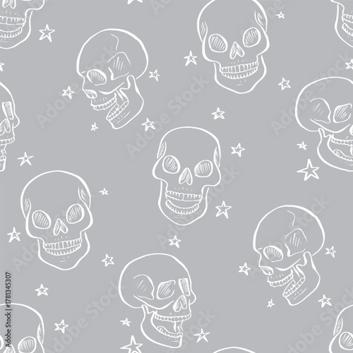 Seamless pattern with monochrome gray and white hand drawn inky skulls with stars