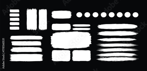 Collection of white brush stroke elements and circles on a black background