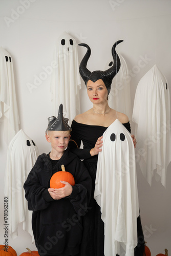 Halloween portrait with costumes and ghostly theme