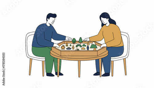 A session in progress with the the using a sand tray and miniature figures to facilitate discussion and expression.