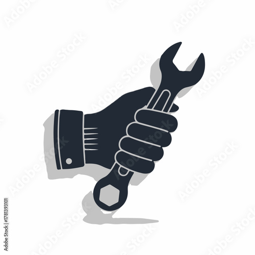 Hand holding wrench for repair and maintenance tasks, showcasing tools for building and fixing. Essential equipment for DIY projects and repairs,