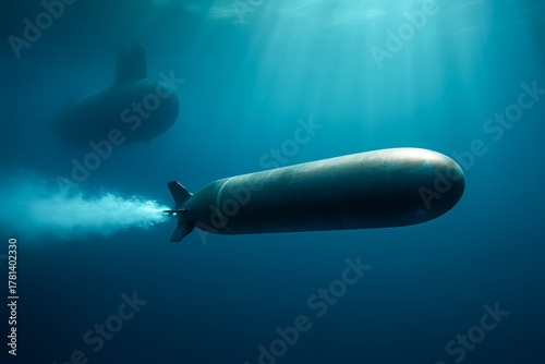 Underwater view of submarine and torpedo in deep ocean