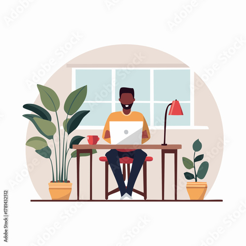 Man working on laptop at home