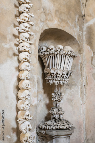 Chalice and column made out of human skulls and bones at Sedlec Ossuary, a 14th-century Roman Catholic chapel, located beneath the Cemetery Church of All Saints, part of the former Sedlec Abbey.