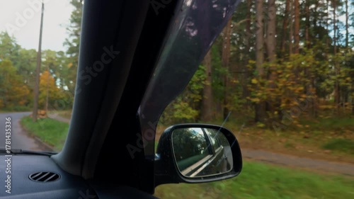 Inside car perspective capturing surroundings, Passenger viewpoint displaying road and scenery