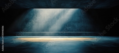 Empty dark room with concrete walls and floor illuminated by natural light beams creating dramatic shadows