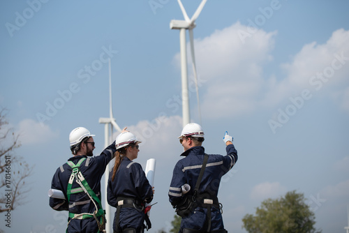 Wind Turbine Maintenance and Repair Technician, Engineer Checking Turbines working maintenance clean power generator system