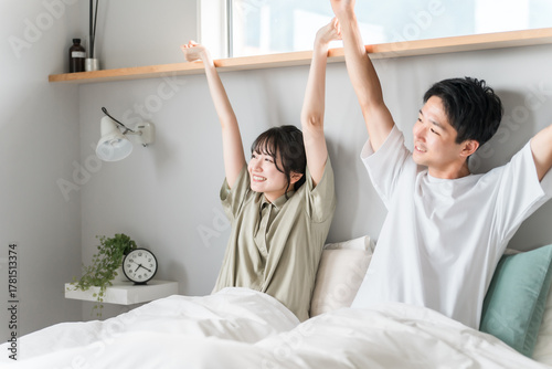 A couple who sleeps soundly and wakes up feeling refreshed (wake up, wake up, sleep)