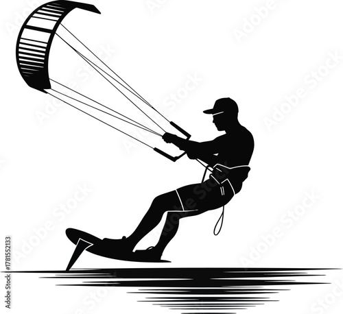 Dynamic kiteboarder riding waves in silhouette style