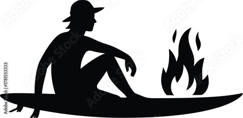 Surfer enjoying a campfire on the beach with a surfboard silhouette