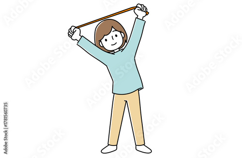 ゴムを使って体側を伸ばす女性