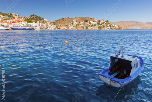 Fishing boat in Symi island bay, Symi, Greece