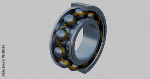 Spinning ball bearing with a cross section showing detailed components including the inner and outer race, steel balls, and brass cage.