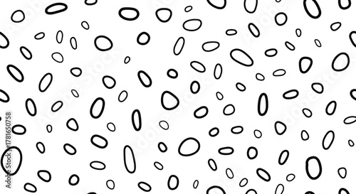Artistic black and white seamless pattern with numerous hand-drawn organic ovals and circles of various sizes and orientations, creating a playful design.