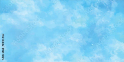 Tableau sur toile A vibrant abstract blue watercolor background suggests a bright, sunny sky with