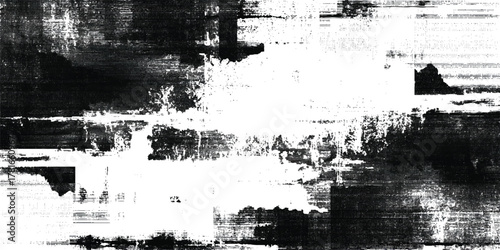 Abstract black ink splatter on white background creating dynamic chaotic texture overlays grunge effects, and creative projects.