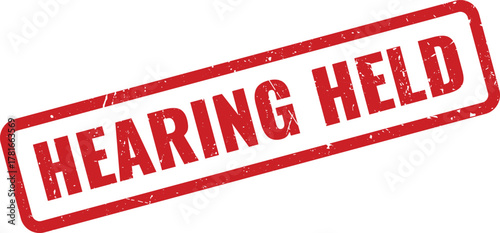 Red grunge style rubber stamp with the important official message HEARING HELD
