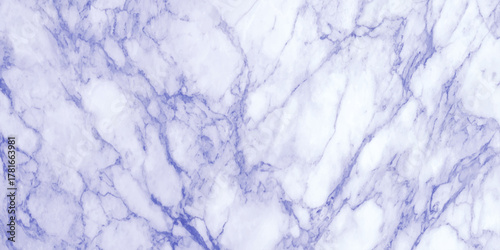 Abstract artwork features flowing blue marble textures blended with ink effects creating a dreamy, ethereal atmosphere. Ideal for backgrounds.