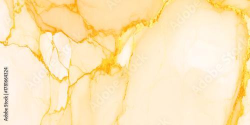 Abstract golden and warm marble texture with fluid white veins and elegant gold accents on a creamy background high resolution.