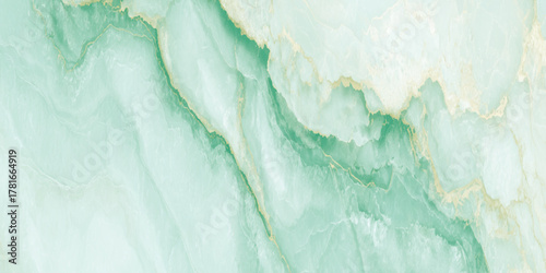 Abstract soft green teal and gold marble texture with fluid veins and organic flow for modern design background.