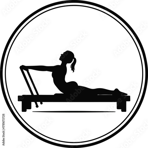 Woman performing pilates exercise on a reformer machine silhouette